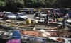 Na marina do Davi, os barcos estão atracando no que era estacionamento